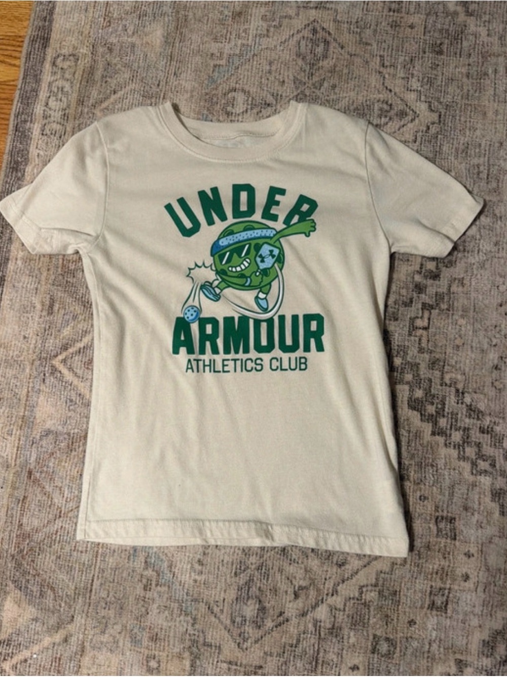 Under Armour Cream Tee with Green Athletics Graphic
